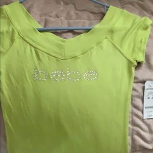 Bebe crew neck T-shirt never worn with logo
